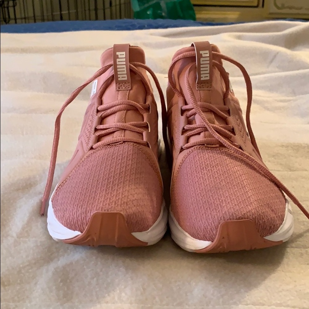 Pink Pumas Size 7 in women’s